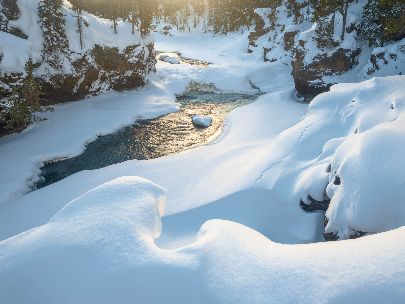 Snow covered river in the winter at Yellowstone National Park