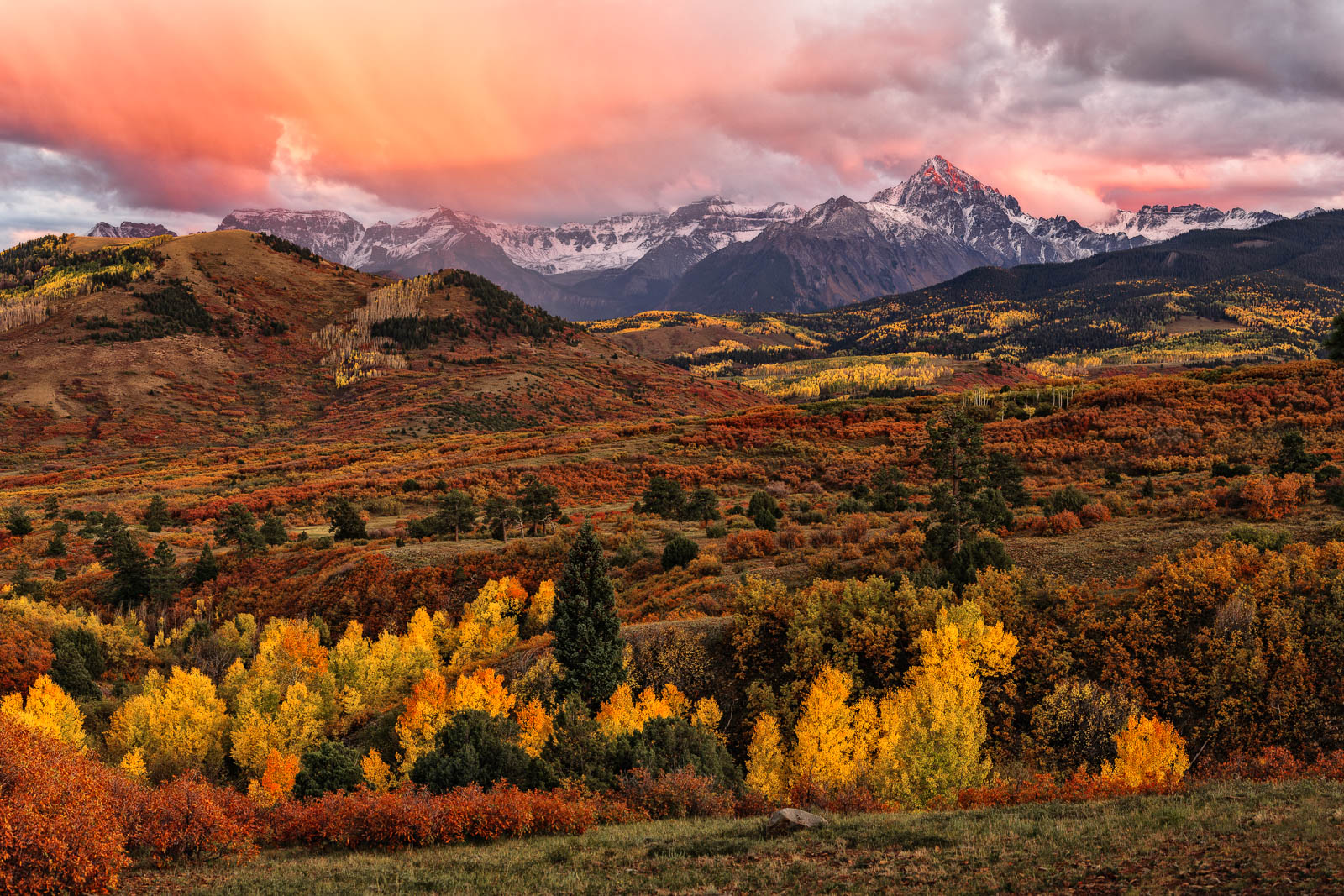 A spectacular sunset erupts over Dallas Divide in the San Juan Mountains of Colorado