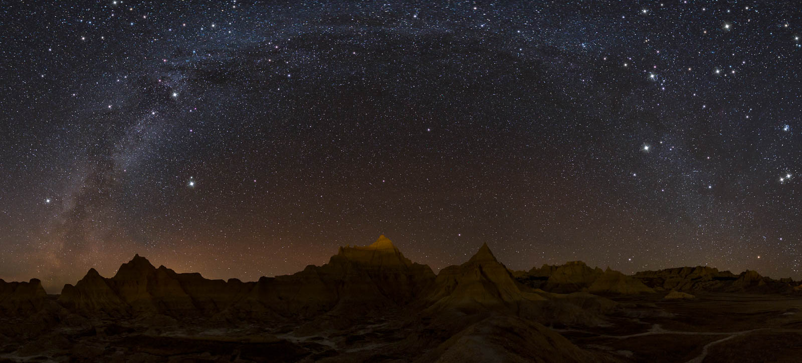 Who says you can't shoot the milky way in the winter? Taken a week ago in the Badlands in South Dakota. This is a 13 image pano...