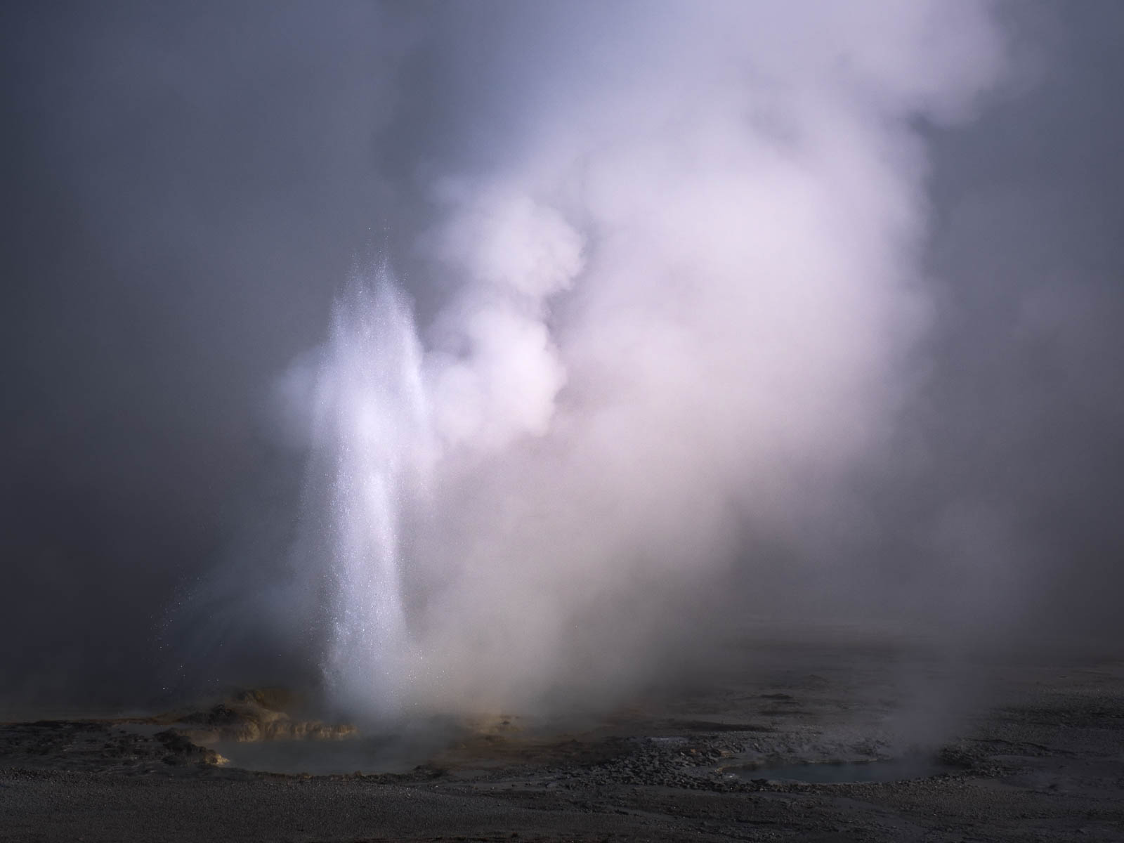 clepsydra geyser erupting in yellowstone