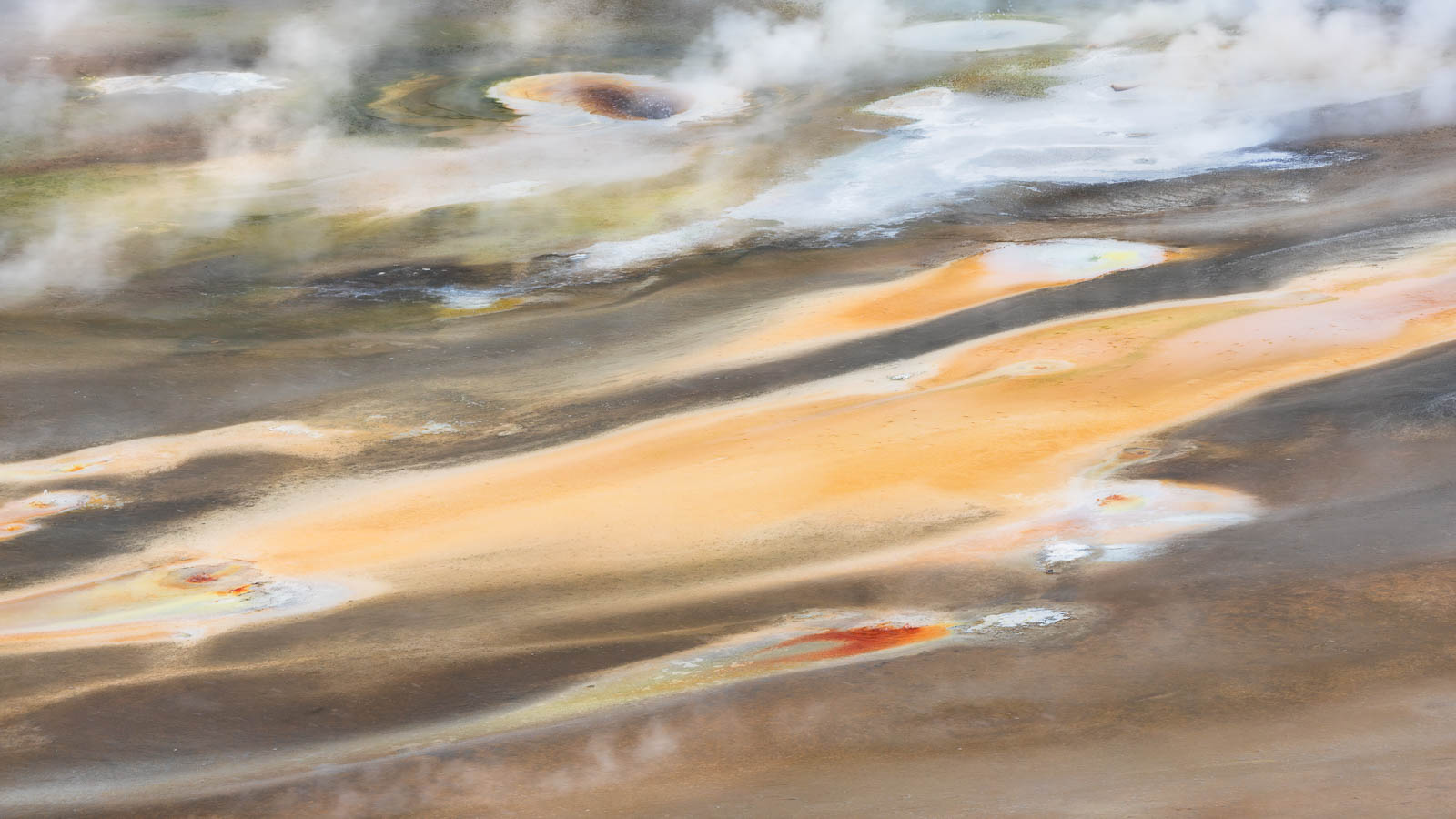 This image offers a captivating glimpse into the ethereal beauty of Porcelain Basin within Norris Geyser Basin, Yellowstone....